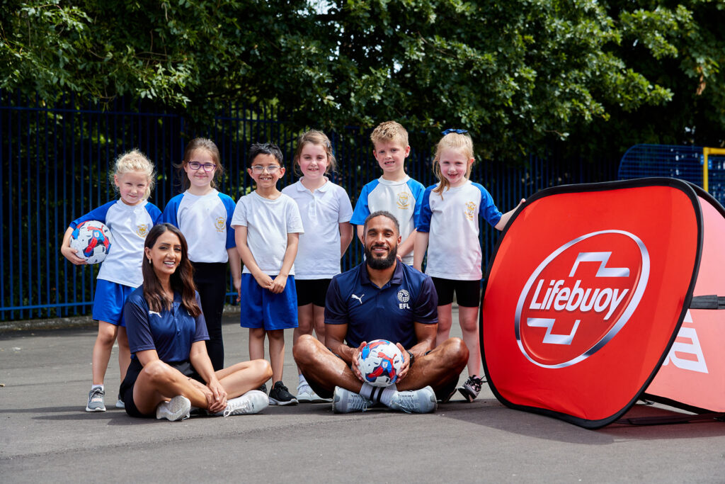 Bela Shah and Ashley Williams visit children in St Oswalds Primary school to join in a Lifebuoys Soaperheros session